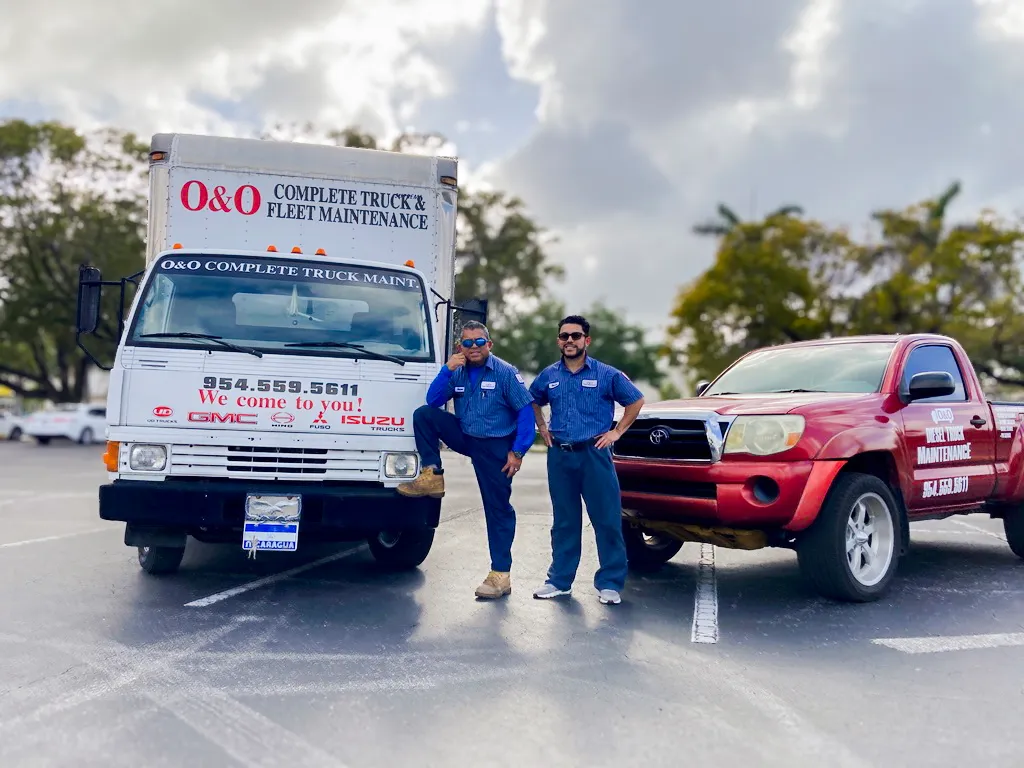 Oscar Castellon & Oscar Castellon Jr - Owners of O & O Complete Truck & Fleet Maintenance - standing side by side.