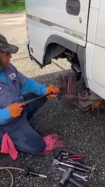 Oscar Sr. changing brakes and rotors